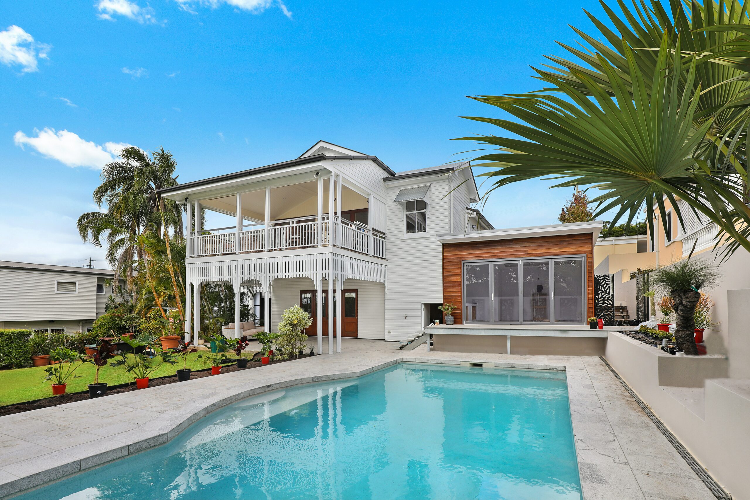 Coastal beach home with pool and tinted windows for hurricane protection in Delaware