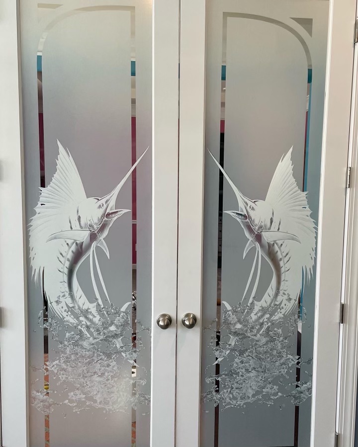 Custom decorative etched marlin design on frosted glass doors in Delaware