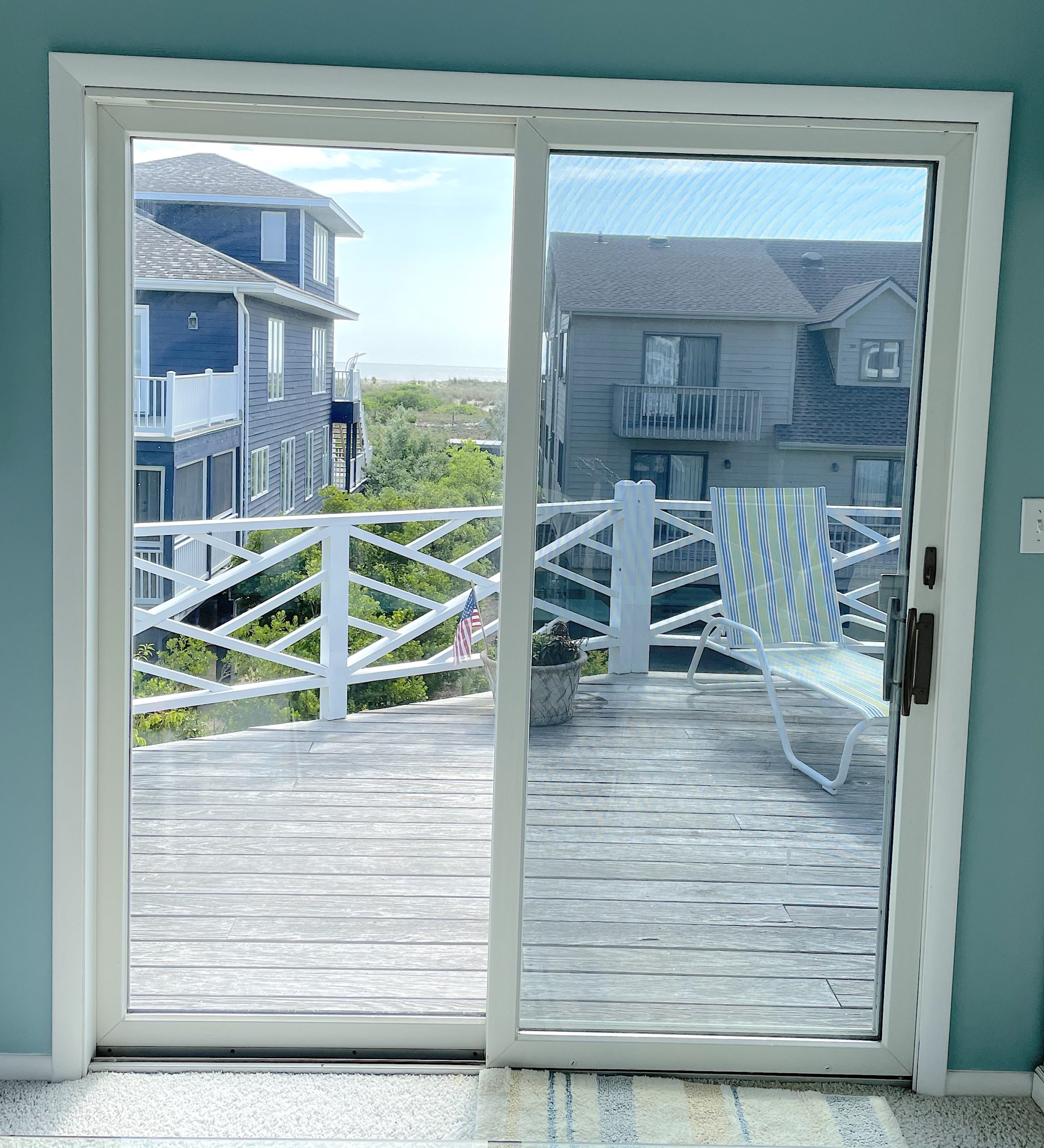 Window film on sliding glass door at Delaware beach house with ocean view