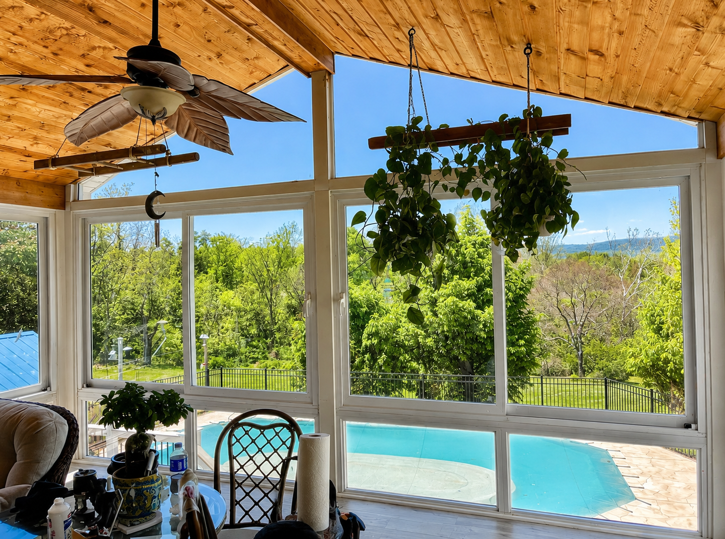 Solar control film on sunroom overlooking pool at Bethany Beach home